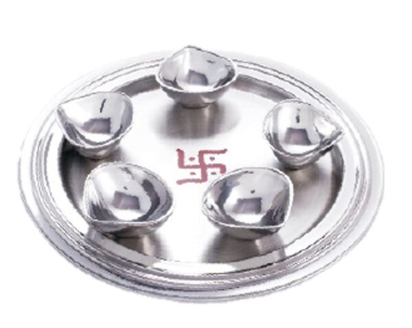 silver thali with diyas